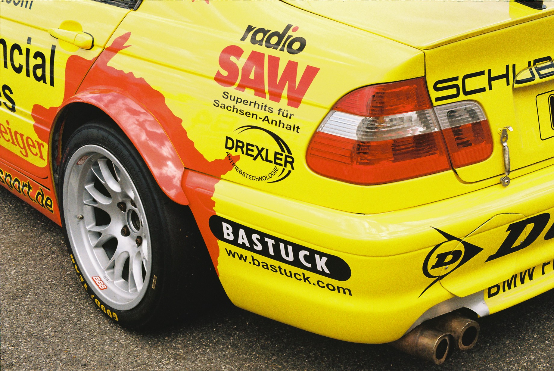 A close up photo of the rear corner of a BMW 320i E46 S2000 car